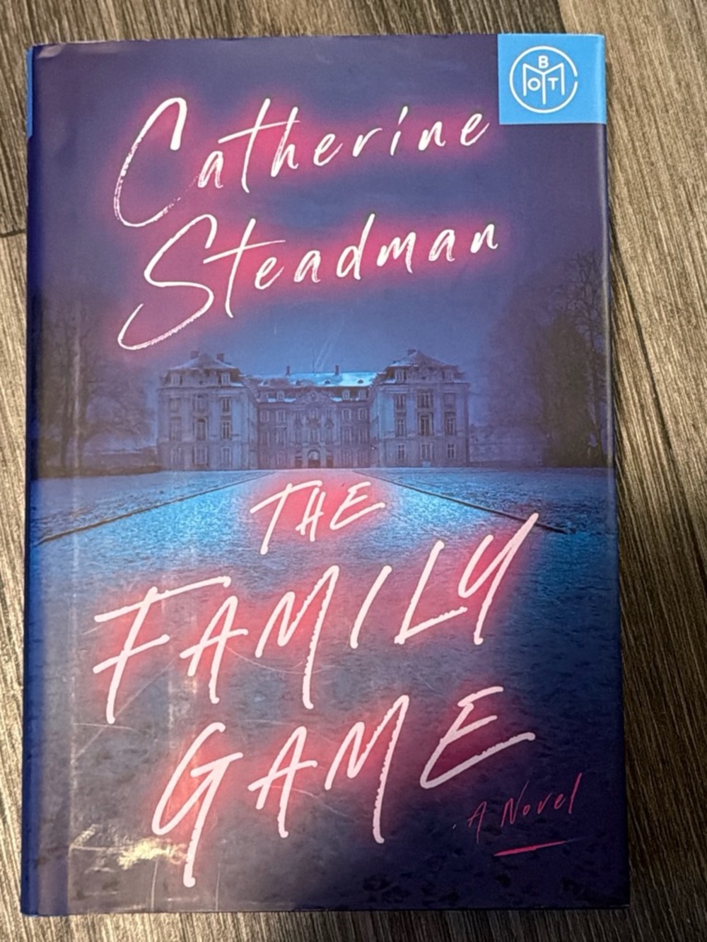 The Family Game - Blue/Purple Hardcover Novel